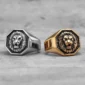 Two Lion King Rings in silver and gold variants, featuring a bold lion head design. Made from 316L stainless steel, symbolizing strength and leadership.